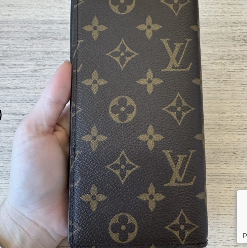 Louis Vuitton long wallet is the Monogram Portefeuille Brazza NM/ REHAB WALLET - Picture 2 of 5